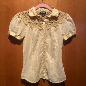 Pale yellow bebe blouse.